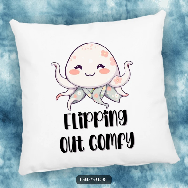 Funny manta ray in a floral kimono, smiling and waving tentacles, depicted on a soft and humorous pillow.