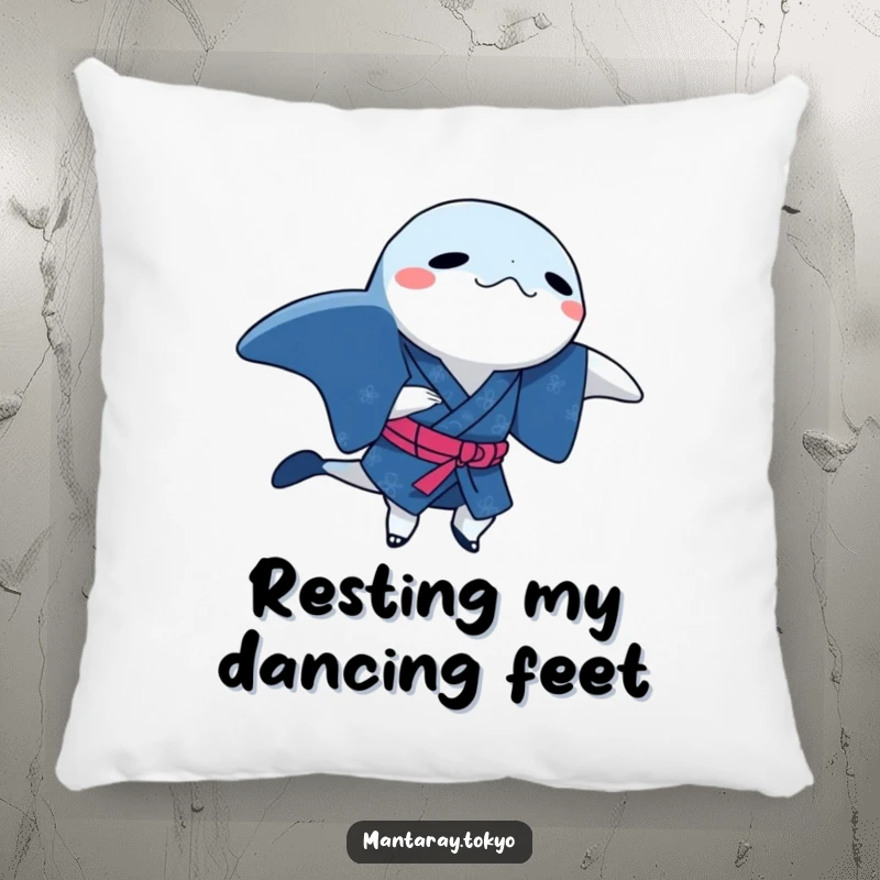 Funny manta ray in a traditional indigo kimono, doing a dance step, depicted on a soft and humorous pillow.