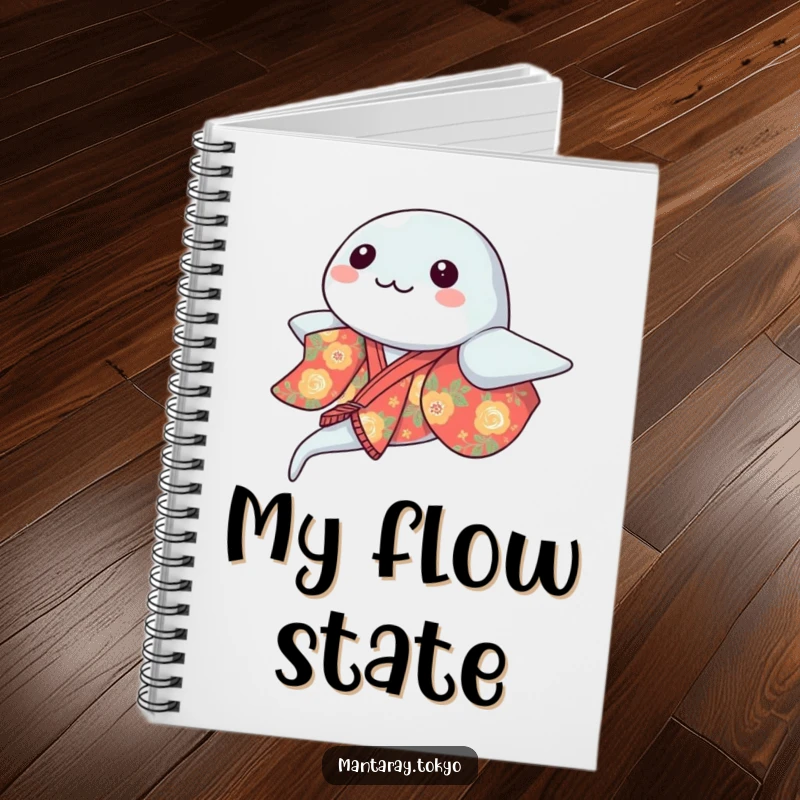 Funny kawaii manta ray in a vibrant kimono gracefully gliding, presented on a humorous notebook, perfect for capturing thoughts.